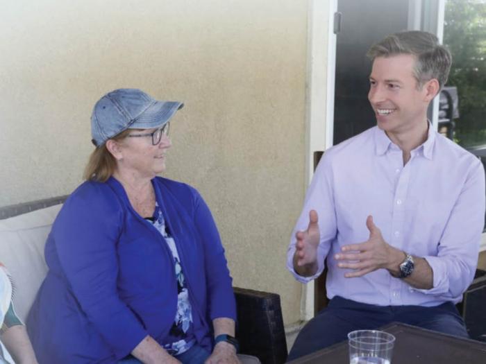 Congressional candidate Will Rollins, right, is withstanding increasing attacks from supporters of his Republican opponent in the race for a Palm Springs House seat. Photo: Courtesy the candidate
