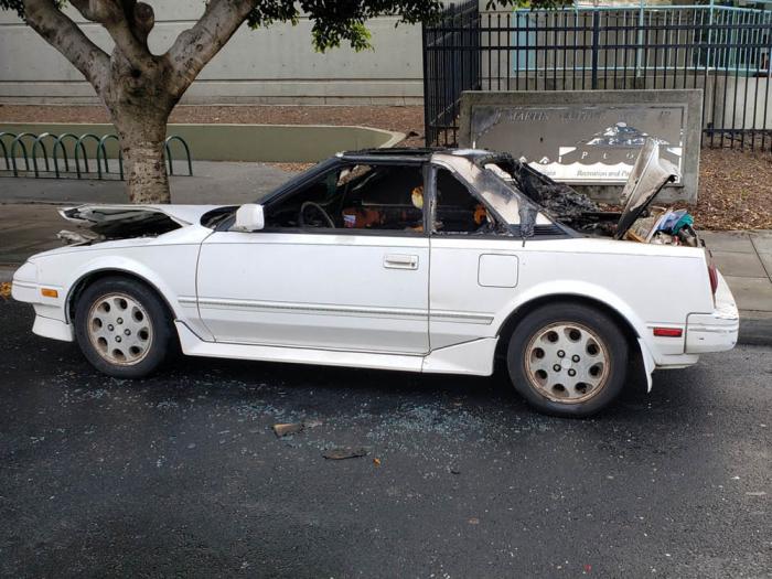 Drag king Fudgie Frottage's 1989 Toyota MR2 SC was destroyed during an apparent arson outside the Martin Luther King Jr. pool June 22. Photo: Fudgie Frottage 