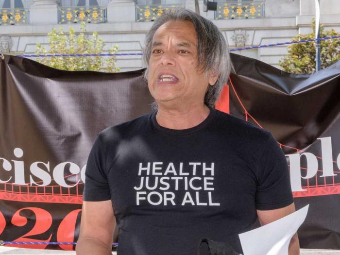 Vince Crisostomo, a long-term survivor of HIV, stood outside at a rally promoting the San Francisco Principles, which looks to promote policies for HIV and aging. Photo: Courtesy Vince Crisostomo