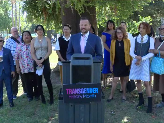 Assemblymember Matt Haney, center, spoke at a news conference in Sacramento September 6 about his resolution to designate August as Transgender History Month in California. Photo: Screengrab<br>