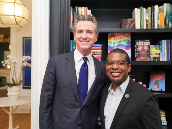 Governor Gavin Newsom, left, signed a bill by Assemblymember Corey A. Jackson, Ph.D. that prohibits book banning in California schools. Photo: Courtesy the Governor's office