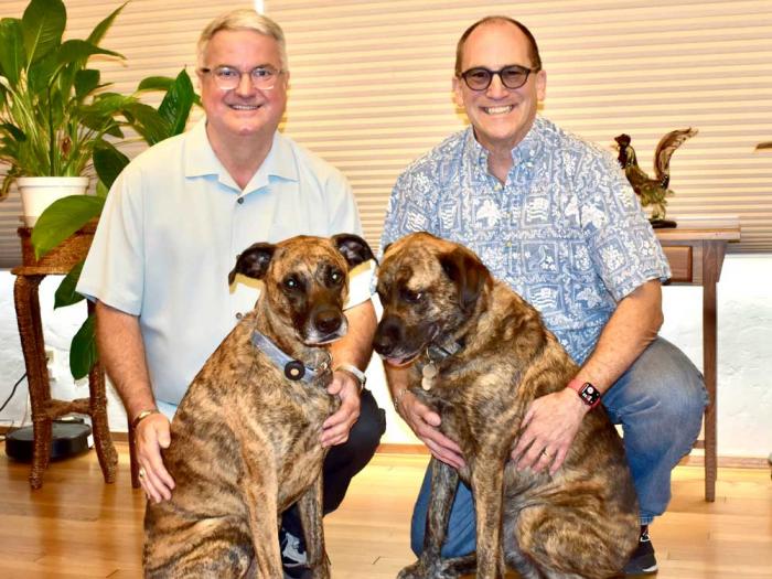 Solano County supervisor candidate Michael Wilson, left, joined his husband, Peter, and their dogs Raffie and Simon. Photo: Courtesy Michael Wilson<br> 