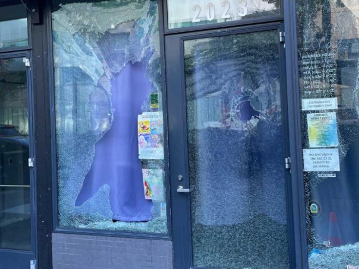 The windows of Oakland's Port Bar were apparently shot through with what police called "weights" early Wednesday morning. Photo: Courtesy Sean Sullivan