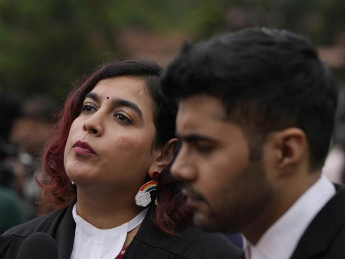 Shivangi, left, and Rahul Sangwan, one of the petitioners, talk to the media after the Supreme Court verdict on petitions that seek the legalization of same-sex marriage, in New Delhi, India, Tuesday, October 17. Photo: AP photo/Manish Swarup