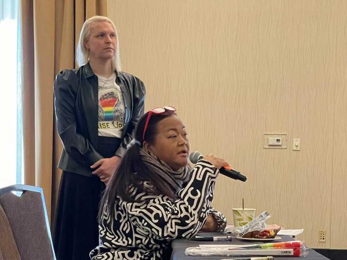Lorna Sumatra, a South Bay preventative health educator for youth and young adults, asked a question at the fifth annual LGBTQ+ Summit, "All Work is Work," in San Jose. Photo: Heather Cassell