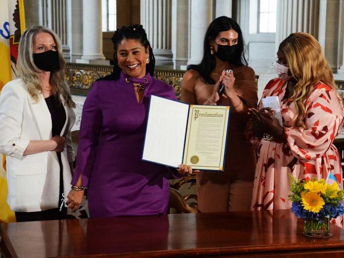 San Francisco Mayor London Breed, shown here signing a Transgender History Month proclamation in 2021, and other city officials have been sued by a second conservative group over the pilot guaranteed income program for transgender residents. Photo: Rick Gerharter