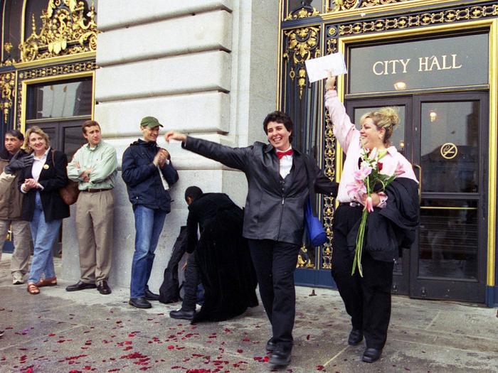 San Francisco City Hall was awash in joy during the "Winter of Love" as a couple just married on February 15, 2004, celebrated their union. Photo: Rick Gerharter