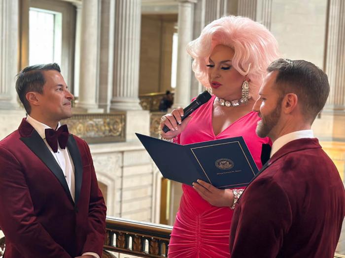 San Francisco drag laureate D'Arcy Drollinger, center, officiated over the marriage of Jorge Jimenez, left, and Scott Wilson, February 14 during the city's celebration of the 20th anniversary of the "Winter of Love." Photo: John Ferrannini