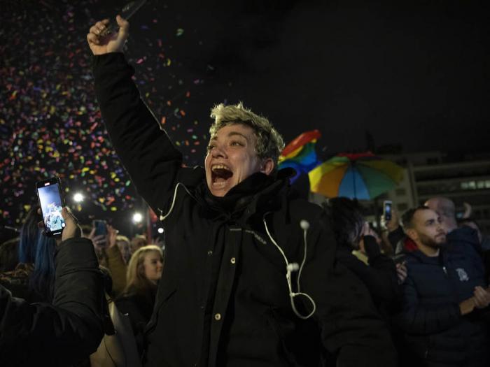 A supporter reacts to the passage of a same-sex marriage bill during a rally at central Syntagma Square, in Athens, Greece, Thursday, February 15. Greece is the first Orthodox Christian country to enact marriage equality. Photo: Michael Varaklas/AP