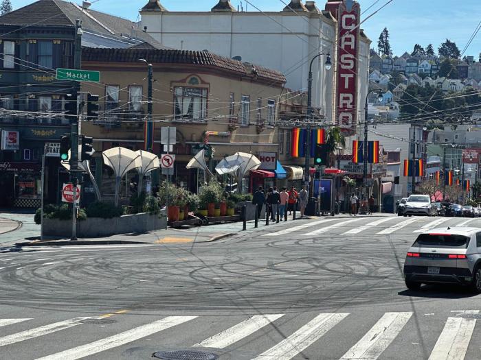 Tire marks at Castro and Market streets March 17 show telltale signs of a sideshow, which San Francisco police are investigating. Photo: John Ferrannini<br>