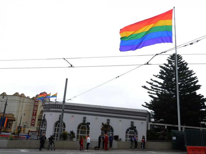 Supervisor Rafael Mandelman has proposed a resolution to start the landmarking process of the oversized rainbow flag that flies at Market and Castro streets. Photo: Rick Gerharter<br>