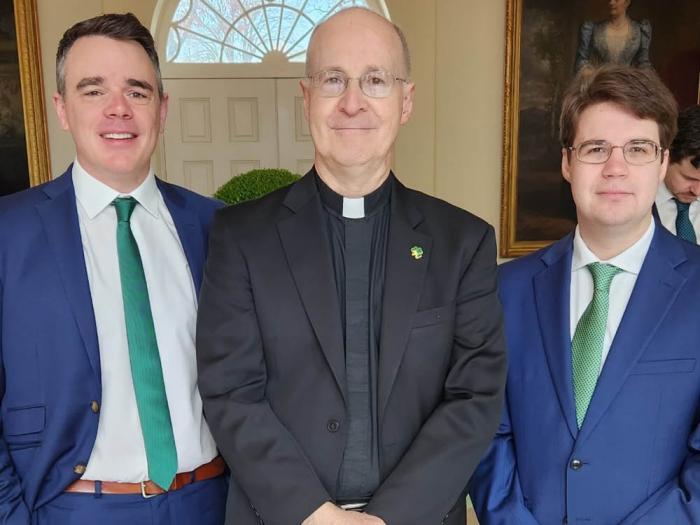Outreach Executive Director Michael O'Loughlin, left, the Reverend James Martin, and Outreach managing editor Ryan Di Corpo were guests of President Joe Biden at a White House event for Roman Catholic leaders on St. Patrick's Day, March 17. O'Loughlin, a gay man, was selected to lead the LGBTQ Catholic ministry that was founded by Martin. Photo: Courtesy Outreach