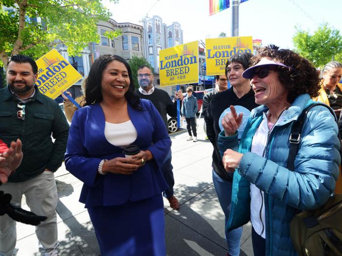 Mayor London Breed, left, spoke with Andrea Aiello, executive director of the Castro Community Benefit District, during the mayor's walk down Castro Street May 3. Photo: Rick Gerharter