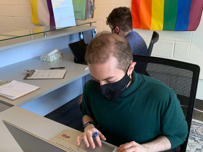 People work at a center that participates in PowerOn. Photo: Courtesy LGBT Tech