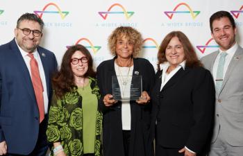 Lesbian travel leader honored by A Wider Bridge